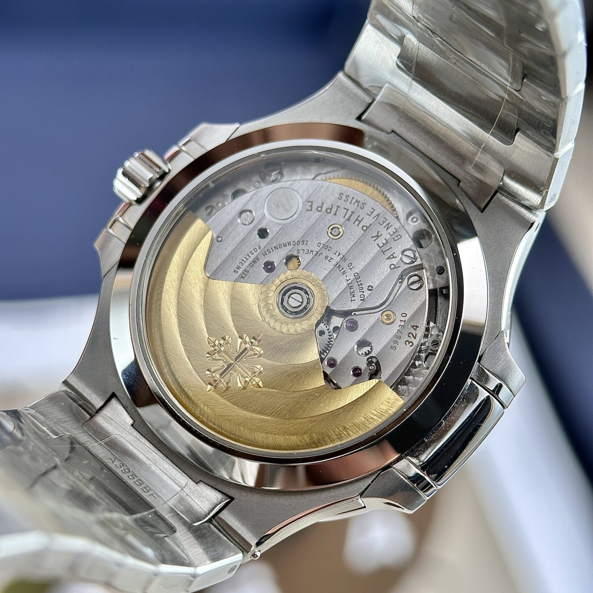 Patek Philippe Nautilus 7118 Super Clone Watch Blue Dial Stone Bezel 35.2mm - Image 8